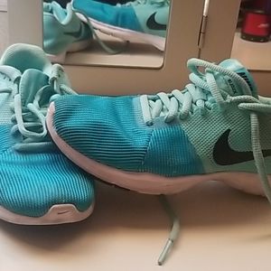 Blue Nike tennis shoes